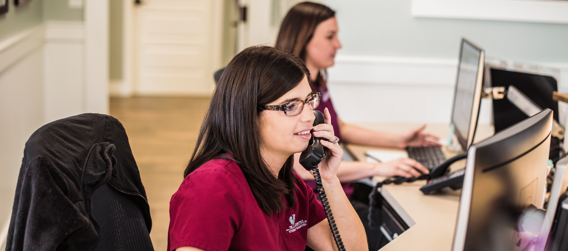 The Country Veterinary Hospital employees on the phone